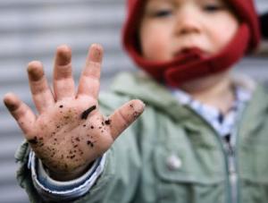Little Boy with Dirty Hands --- Image by © T. Kruesselmann/zefa/Corbis