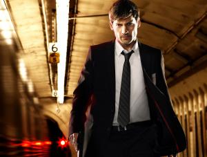 Nikolaj Coster Waldau jako John Amsterdam